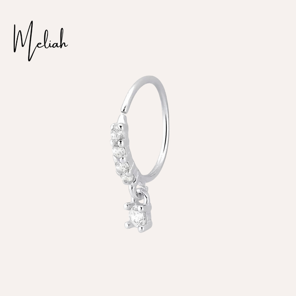 Piercing argola com pedras cravejadas e pingente